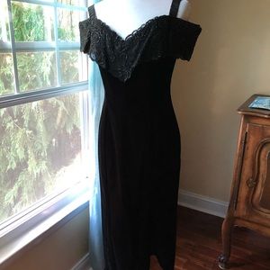 Classic vintage velvet off the shoulder dress.